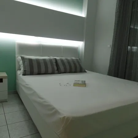 Отель Ouzas Luxury